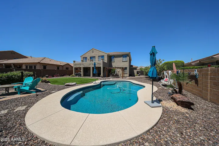 NICE FIREPIT AREA RIGHT NEXT TO POOL. PERFECT FOR FALL EVENINGS