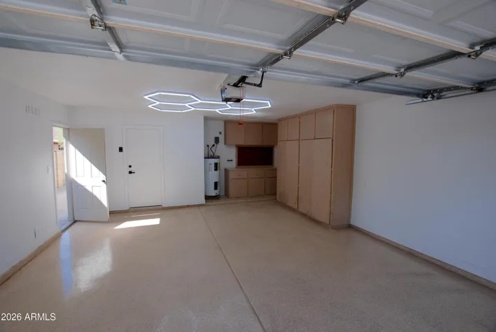 See open door to side paved area