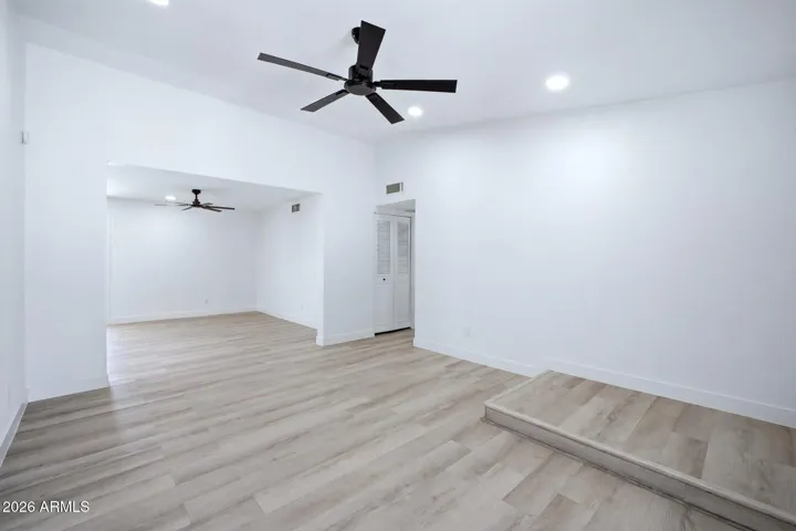 Freshly painted throughout with new flooring, new fans