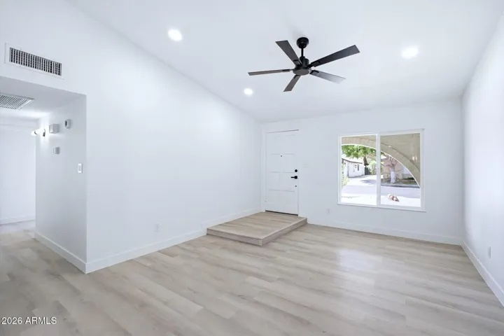 Front door, living room, all new windows throughout
