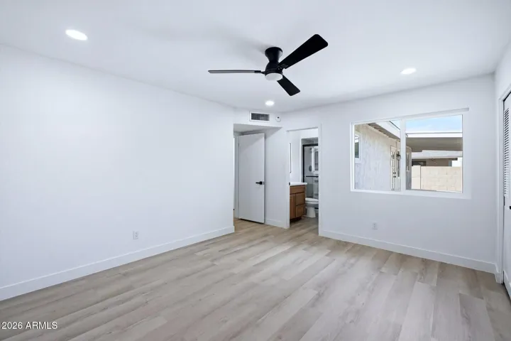 Primary bedroom window to backyard