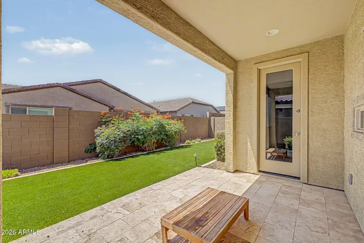 Private, serene backyard is beautifully landscaped