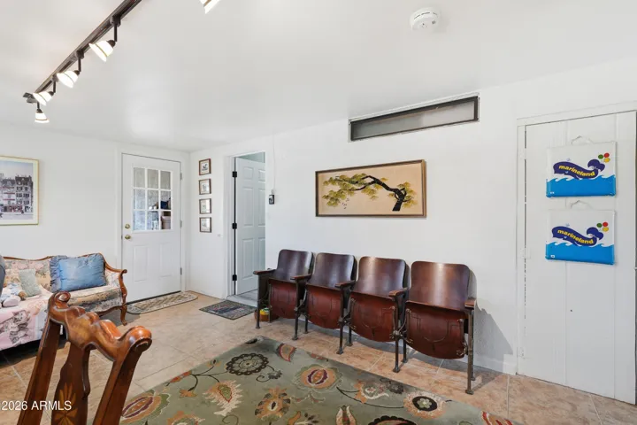 enclosed carport turned into an office and sroreroom Heated and cooled by a window unit