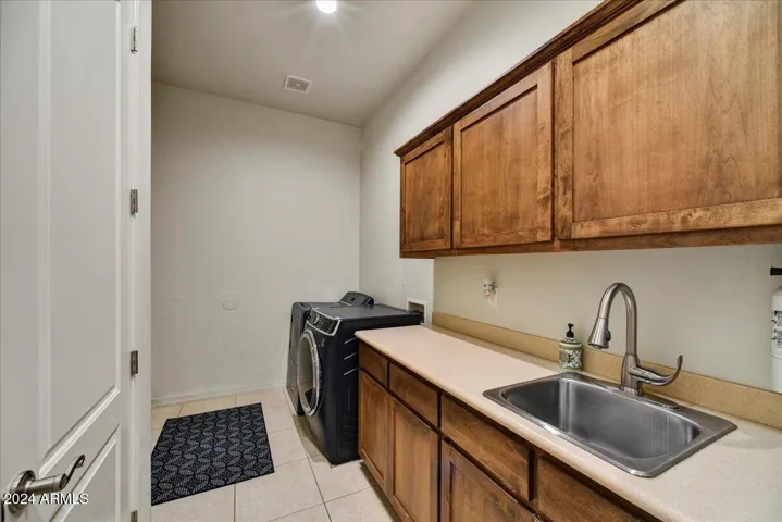 Laundry room with skylight