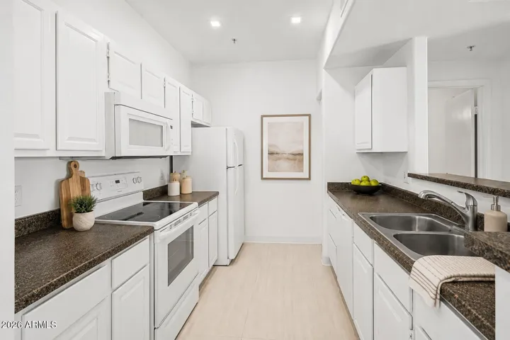 Roomy working kitchen (digitally staged)