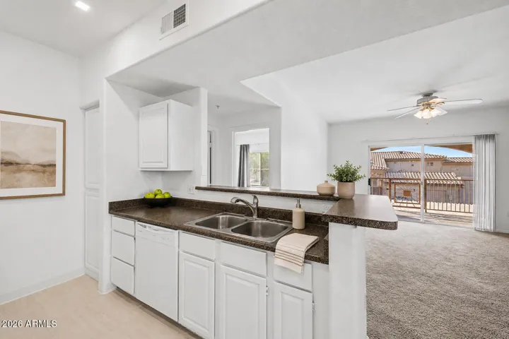 Open Concept into living area (digitally staged)