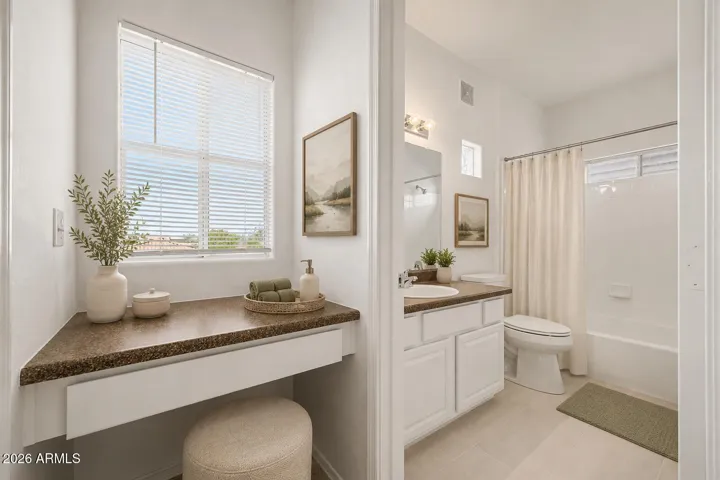 Vanity and 1st Master Bath (digitally staged)