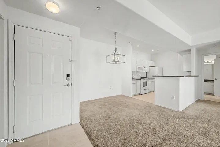 Modern light fixture over dining area