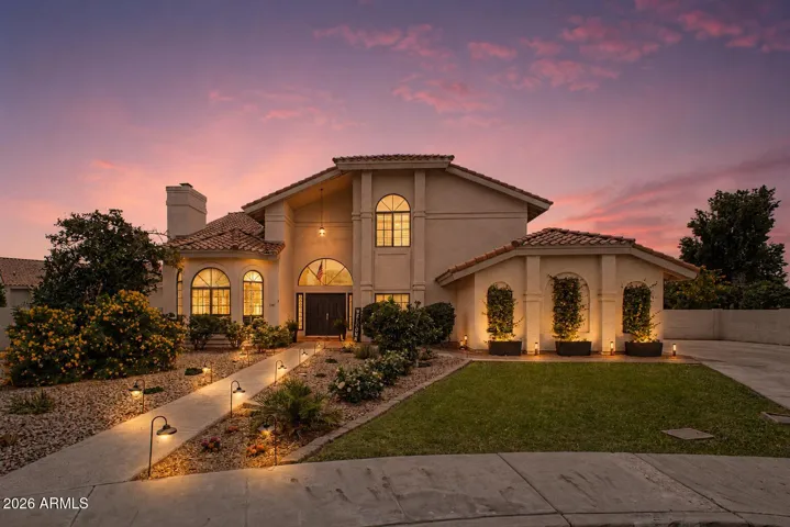 Welcome to this beautifully remodeled home in 2021 with gorgeous finishes and located on a quiet cul-de-sac. (Virtual twilight)