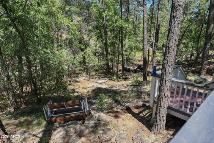 Price views off of the large deck overlooking a season creek