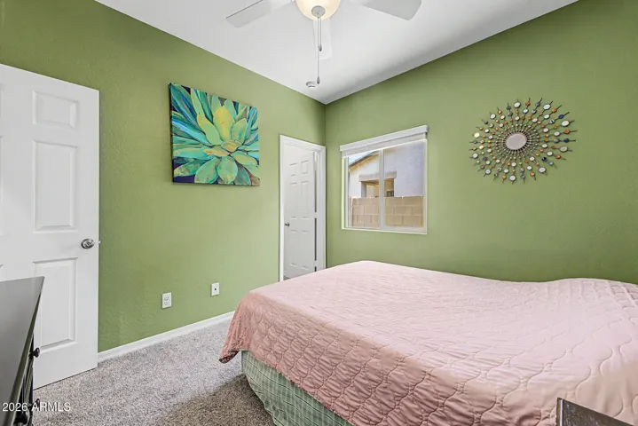 Guest Bedroom includes walk-in closet.