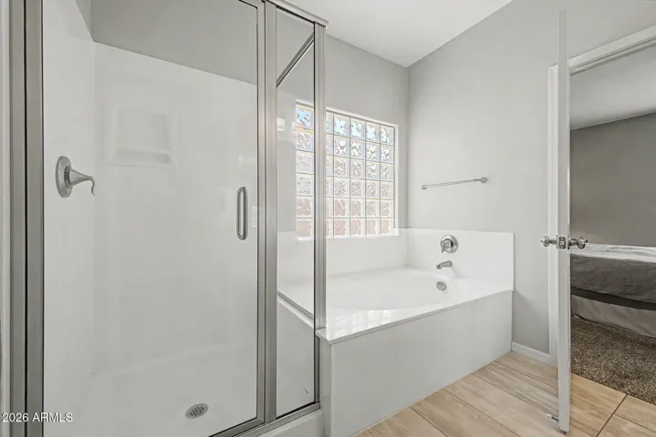 Primary Bathroom with Separate Shower and Tub.