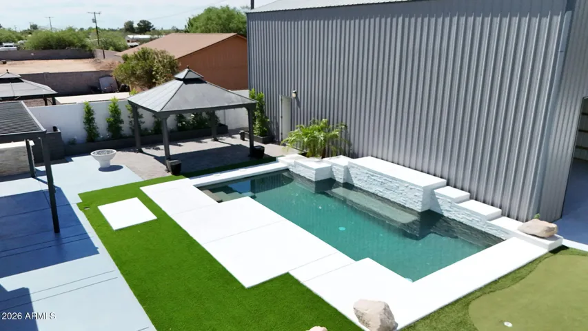 All concrete in backyard has been newly painted.