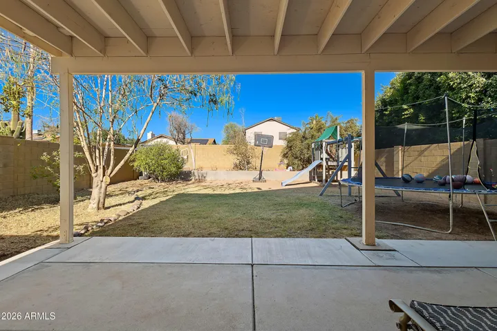 Full wraparound covered patio extends your living space outdoors.