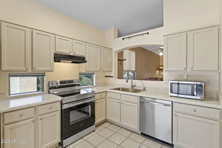 Professionally painted kitchen cabinets with organizers built in most drawers and cabinets