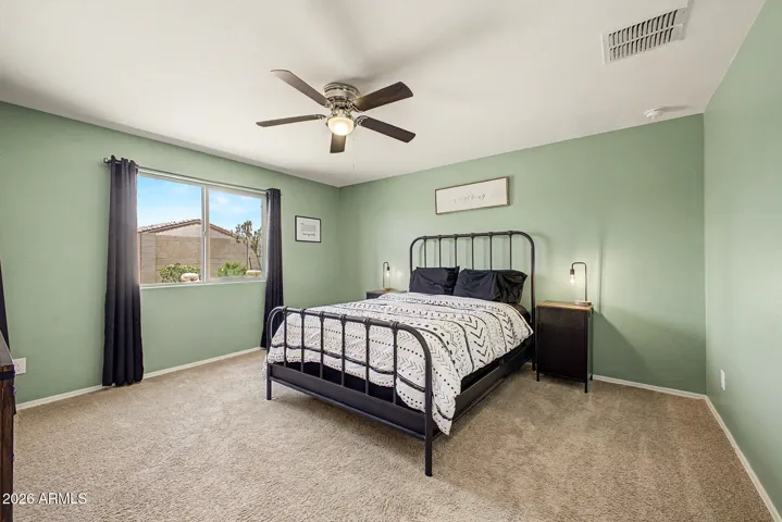 Spacious primary bedroom featuring a generous walk-in closet.