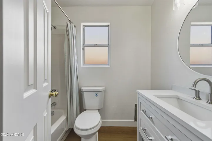 new vanity, fixture, mirror, light, toilet - even the valve was replaced!