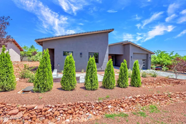 Small front Patio with privacy from landscaping