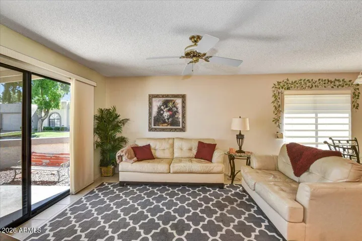 An alternate angle of the spacious family room highlights the generous layout, perfect for hosting guests or relaxing with family.