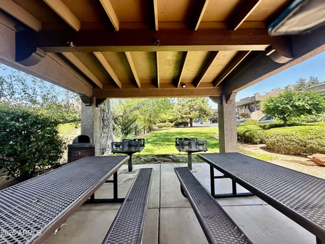 Common area: bbq picnic tables by the pool