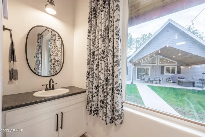 Half Bathroom - Vanity and Private Toilet Room.
