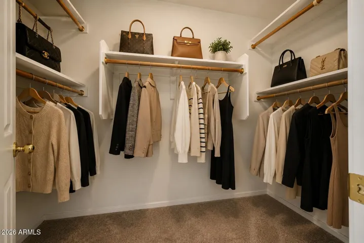 Ai staging. Clothes and purses not included when you Buy this Home.