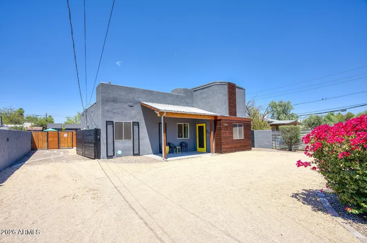 Circular driveway and side driveway electronic gated entry.