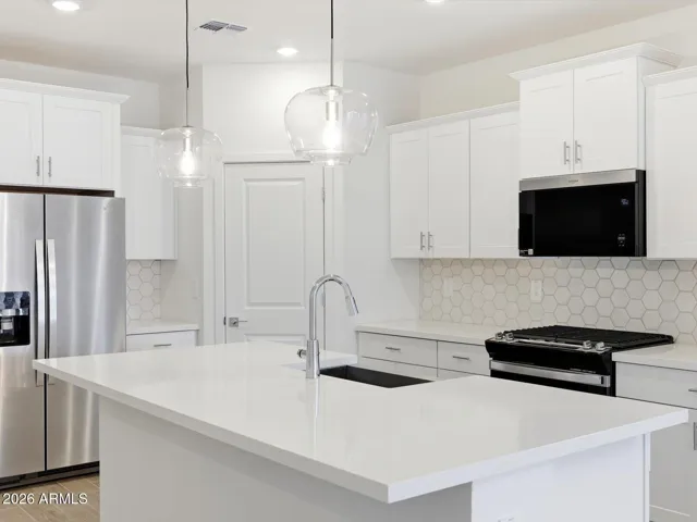Photo is not of the actual home. Interior finishes and fixtures may vary.