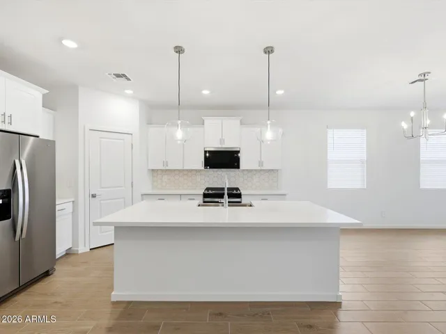 Photo is not of the actual home. Interior finishes and fixtures may vary.