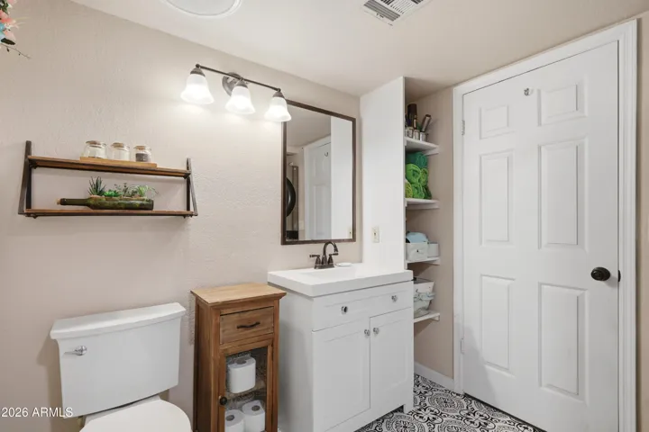 Remodeled bathroom with great storage.