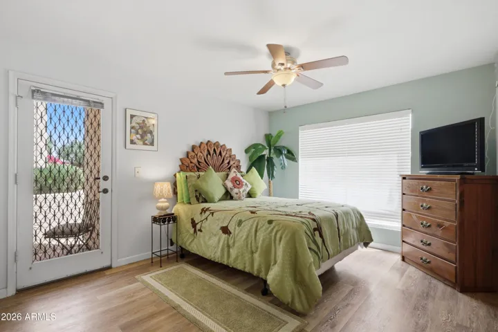 Bedroom has a private patio entrance.