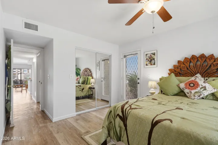 Closet is deep with ample room for storage.