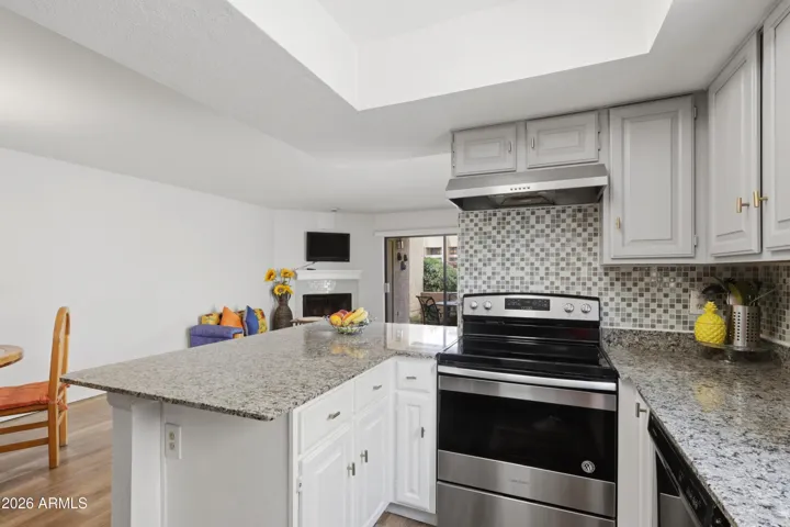 Kitchen is open to dining and living.