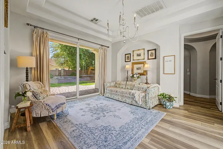 Dining/sitting room with backyard access & gas fireplace