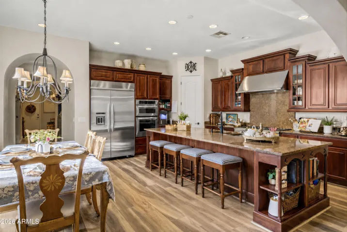 Gourmet kitchen w/48" range, wall oven & built in fridge