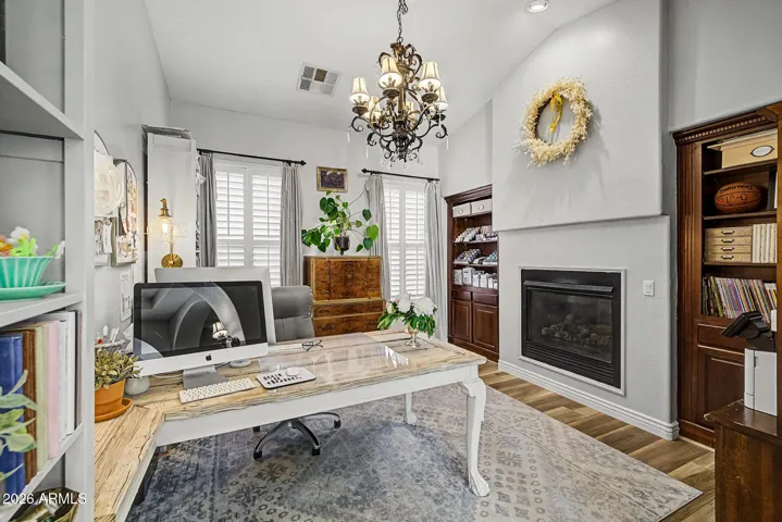Office with fireplace