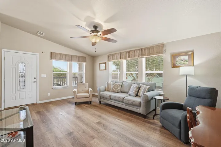 Vaulted ceilings and lots of windows in the large living room