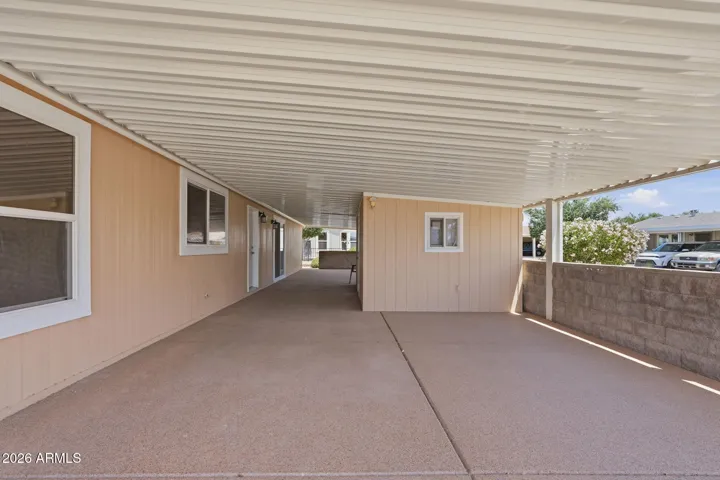 There's room to park two vehicles under the carport.