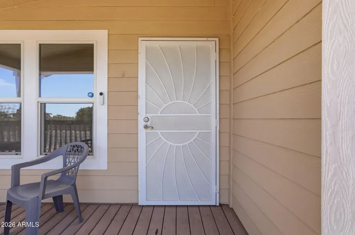 The front porch has plenty of room for a little table and 2 chairs
