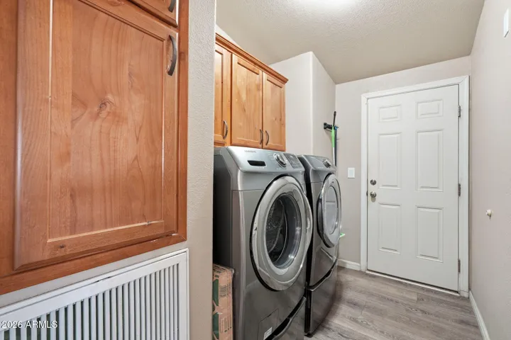 Cabinets in the laundry room for storage