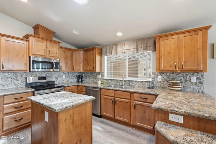 There is a lot of storage in the kitchen and the island gives you more prep room