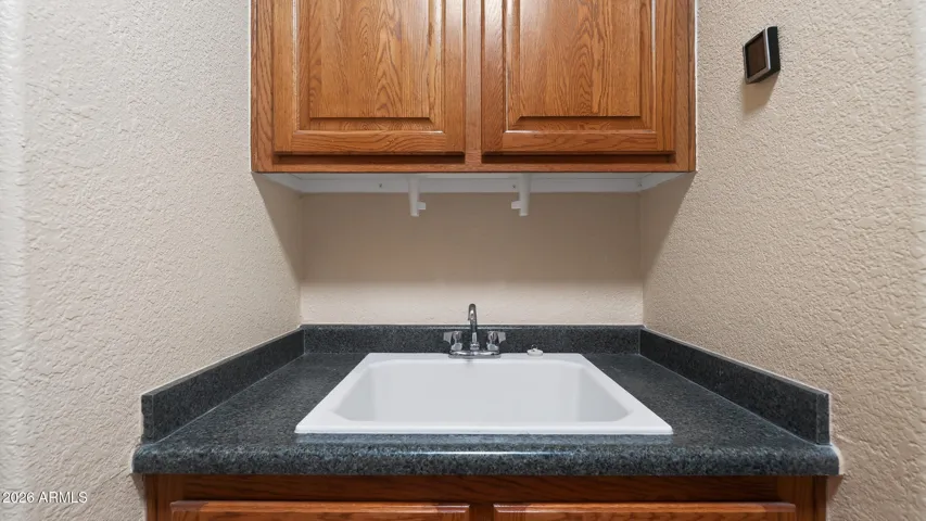 Laundry room sink and storage