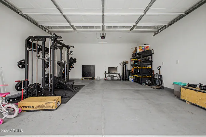 Main garage w/ 2 car parking spots