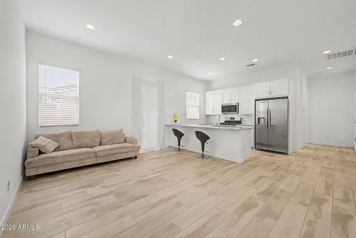 Open concept next Gen Suite with private kitchen w/ SS appliances