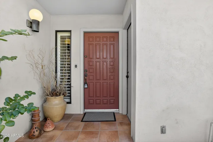 Door to the right of the entry door is a private storage closet.