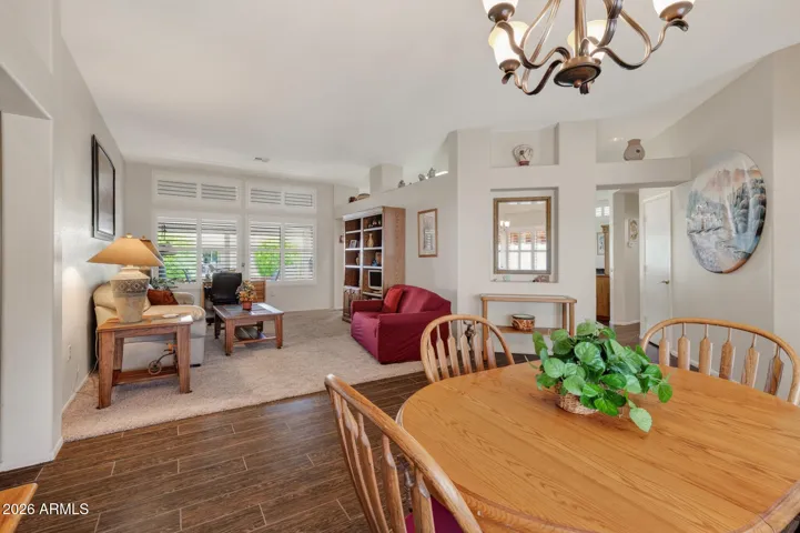 Behind the wall is the kitchen, so your dining prep work is hidden from your guests.