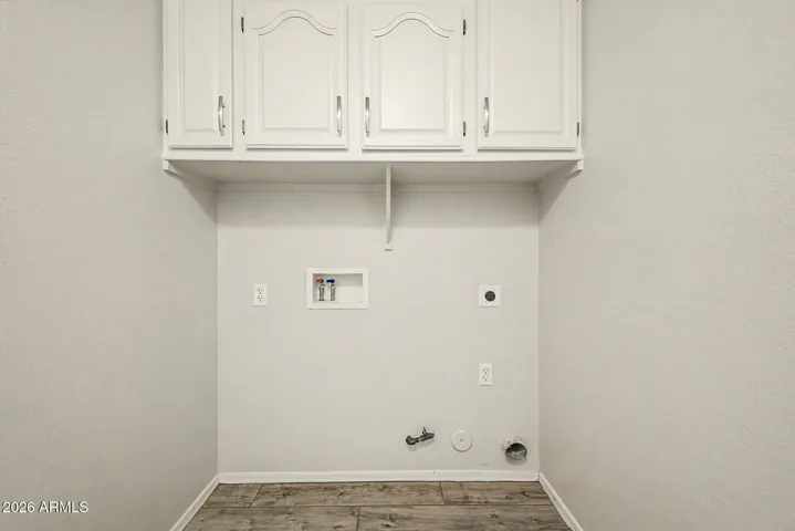 Laundry with cabinets