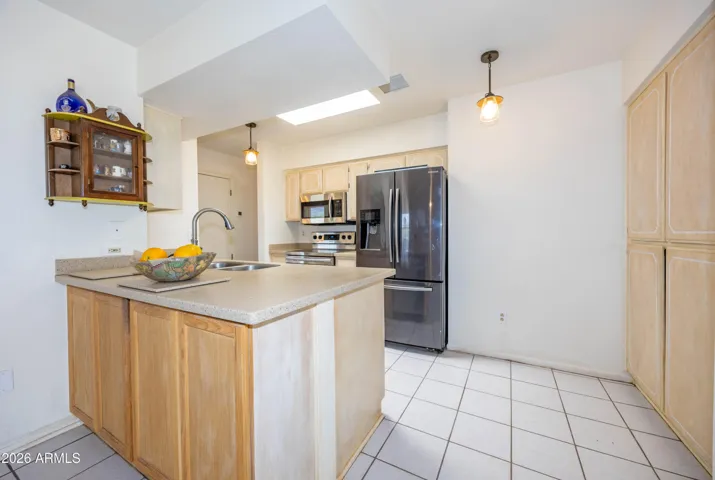 view from dining area into kitchen