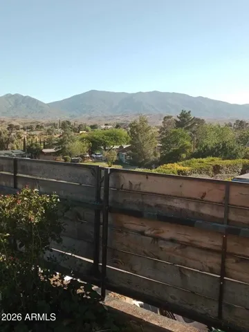 Mountain and city light views with elevated lot