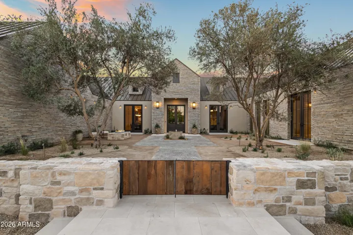 Front Exterior + Gated Front Courtyard